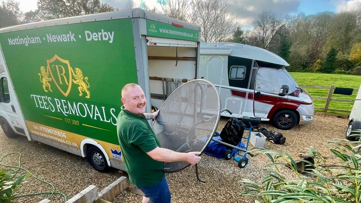 Removal team loading furniture, Nottingham house move.